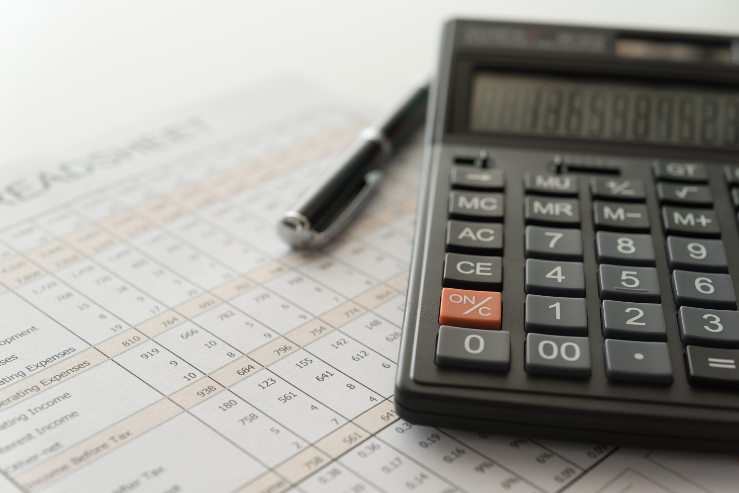 Ledger book and calculator.